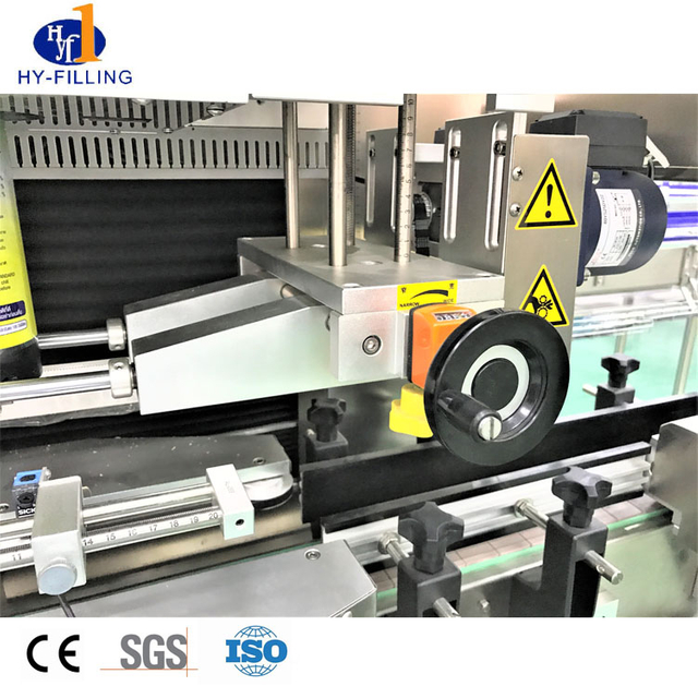 PVC/Pet/OPS Shrink Sleeving Labeling Machine ለቤት እንስሳት ጠርሙስ